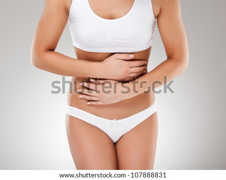 Woman massaging pain stomach