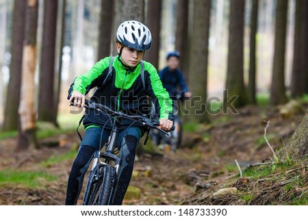 Young people riding bikes