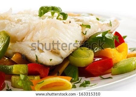 Fish dish - boiled fish fillet with vegetables