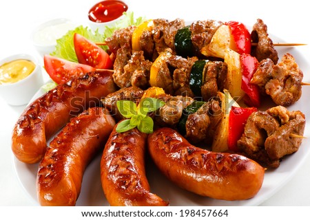 Grilled meat, sausages and vegetables