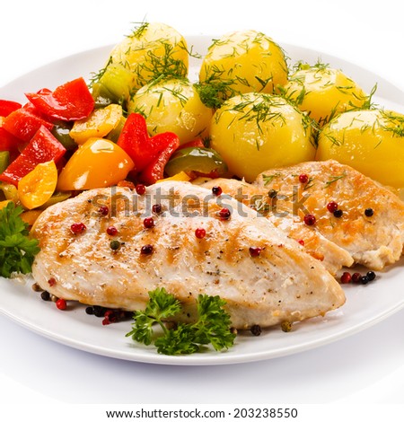 Grilled chicken fillet, boiled potatoes and vegetables