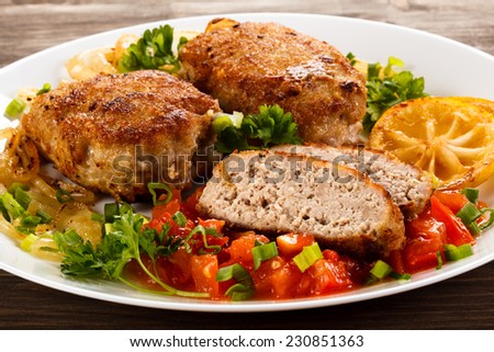 Fried chops and vegetable salad