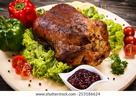 Roast duck on cutting board
