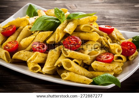 Pasta with pesto sauce and vegetables