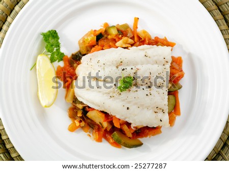 Boiled fish and mixed vegetables