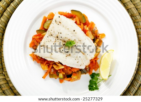 Boiled fish and mixed vegetables