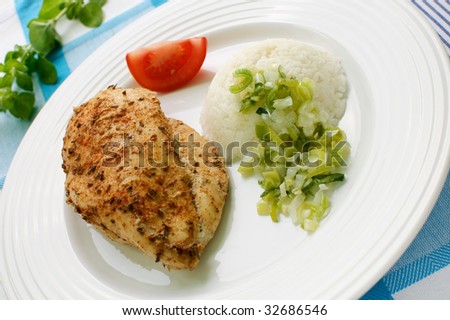 Roasted chicken fillet with white rice