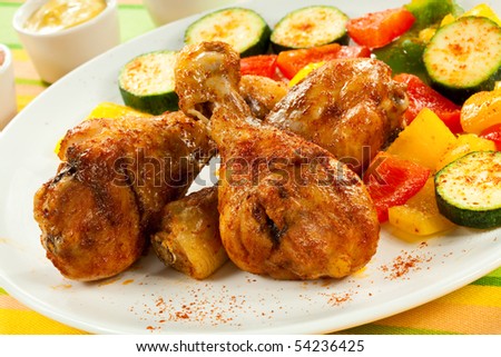 Roasted chicken drumsticks with vegetables