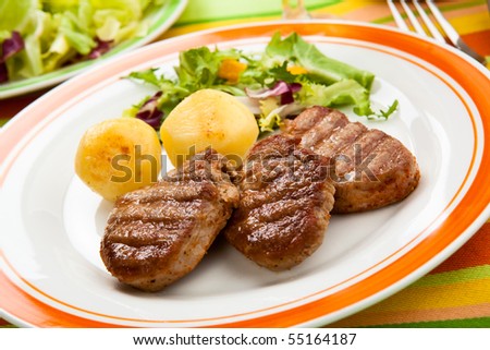 stock photo : Grilled steaks and vegetables