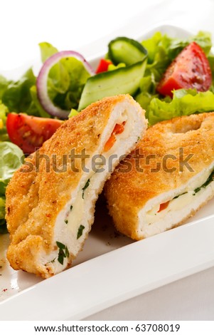 Stuffed turkey fillet with cheese and vegetables