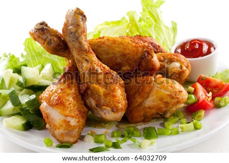 Grilled chicken drumstick and vegetables