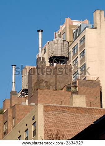 Rain water tower on top of a New York City apartment building.