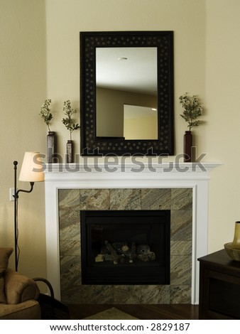 Fireplace and mantel with mirror