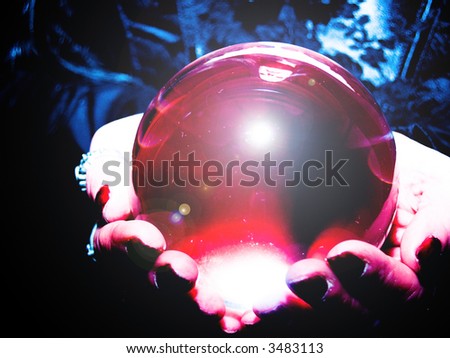 crystal ball glowing in hands