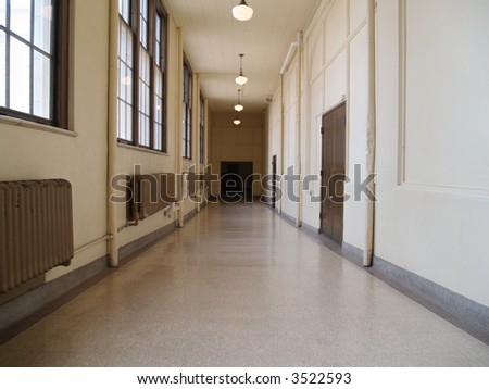 A long hallway in an old high school