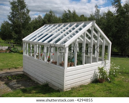old wooden greenhouse