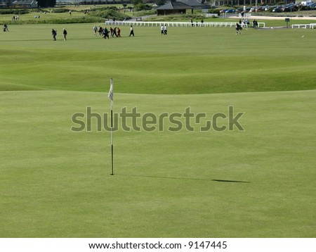 golfers on st andrews golf course scotland
