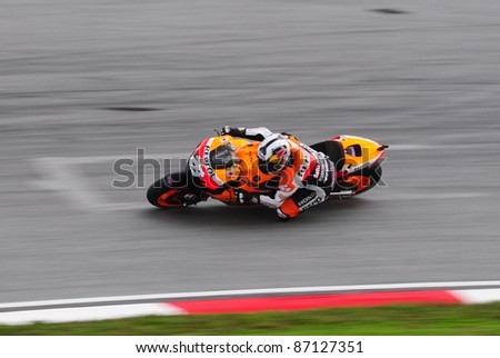 SEPANG,MALAYSIA-OCT.21:Dani Pedrosa of Repsol Honda in action during practice session of Shell Advance Malaysian Moto GrandPrix on Oct. 21 2011 in Sepang, Malaysia. The MotoGP class race will be held on Oct. 23, 2011.