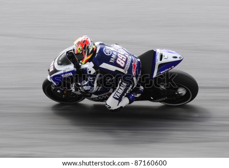SEPANG,MALAYSIA-OCT.21:Nakasuga of Yamaha Team in action during practice session of Shell Advance Malaysian Moto GrandPrix on Oct. 21 2011 in Sepang.The MotoGP class race will be held on Oct. 23, 2011