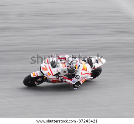 SEPANG, MALAYSIA-OCT.21:Aoyama in action during practice session of Shell Advance Malaysian Moto GrandPrix on Oct. 21 2011 in Sepang, Malaysia.The MotoGP class race will be held on Oct. 23, 2011