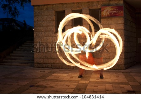 VELIKO TARNOVO, BULGARIA - JUNE 2: Fire dance group performs fire show at club Ozarenie, on June 2, 2012 in Veliko Tarnovo, Bulgaria.