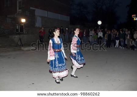 ARBANASSI, BULGARIA - MARCH 24: Veliko Tarnovo\'s dance group perform a traditional ring dance to celebrate \