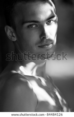 Young man\'s face.black and white