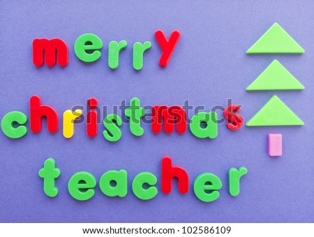 Merry Christmas Teacher Message Written In Magnetic Letter. Christmas