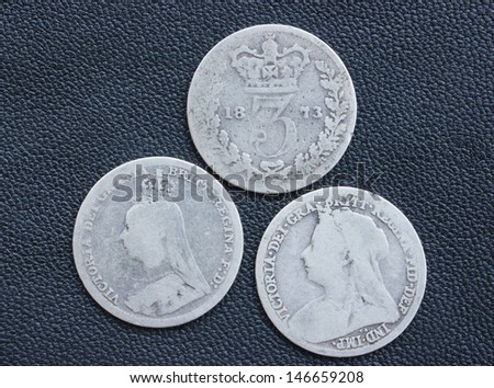 Three Queen Victoria silver threepences from the 19th century (from 1873, 1891, 1898). Concept for history of the British Empire, Victorian time or collecting old coins.