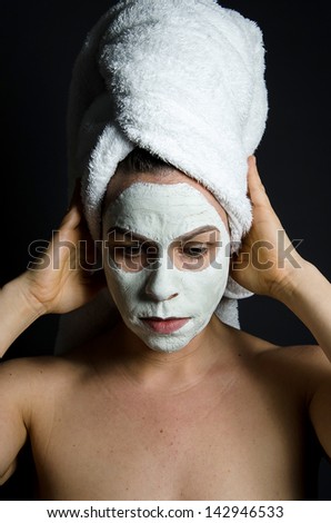 Portrait of a Woman wearing beauty mask