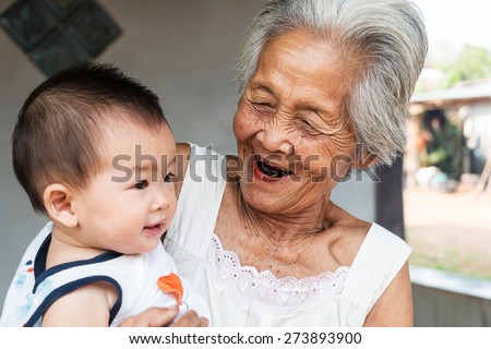 Asian Grandmother with baby