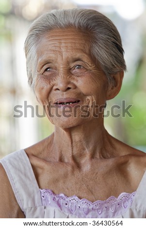 Portrait old grey haired woman, Asia