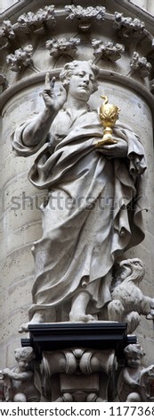 BRUSSELS - JUNE 22: Statue of st. John the Evangelist by sculptor Tobias from year 1645 in baroque style from gothic cathedral of Saint Michael and Saint Gudula on June 22, 2012 in Brussels.