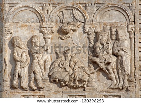 VERONA - JANUARY 27: Relief of Adoration of Magi and pastors from facade of Basilica San Zeno. Reliefs is from sculptor Nicholaus and his workshop on January 27, 2013 in Verona, Italy.