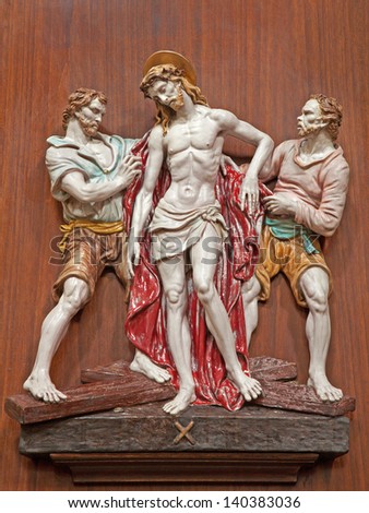 VERONA - JANUARY 28:  Jesus Stripped of His Garments. One part of ceramic coss way from st. Nicholas church (Chiesa di San Nicolo) on January 28, 2013 in Verona, Italy.
