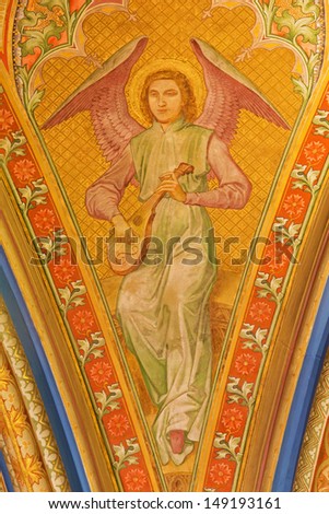 VIENNA - JULY 27: Fresco of angel with the music instrument from vestibule of monastery church in Klosterneuburg from 19. cent.  on July 27, 2013 Vienna.