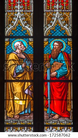 BRATISLAVA, SLOVAKIA - JANUARY 14, 2014: Apostle Peter and Paul on windowpane from 19. from manufactures of Karola Geyling and Eduarda Kratzmann in st. Martin cathedral.