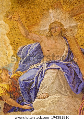 VENICE, ITALY - MARCH 11, 2014: Exterior mosaic from st. Mark cathedral over the main portal. Victorious Jesus with the cross.