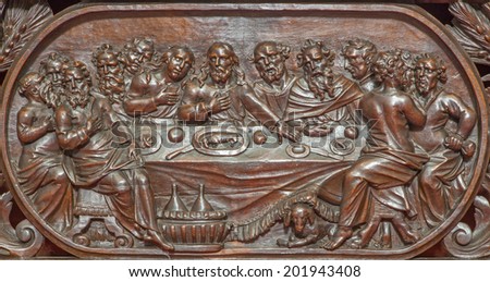 BRUGES, BELGIUM - JUNE 13, 2014: The carved relief of the Last supper of Jesus  in Karmelietenkerk (Carmelites church)  by carmelite Victor van de Heilige Jacob fromk 17. cent.