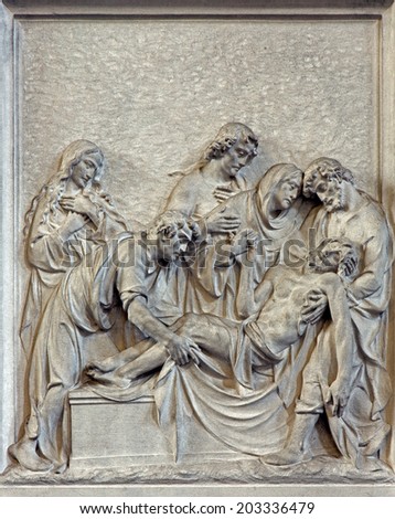 BRUSSELS, BELGIUM - JUNE 15, 2014: Stone relief the Burial of Jesus scene in church Notre Dame du Bon Secource.