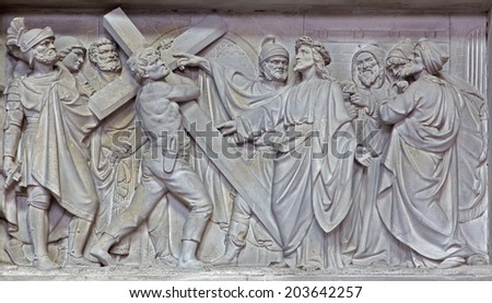 MECHELEN, BELGIUM - JUNE 14, 2014: Stone relief Jesus carries his cross in church Our Lady across de Dyle.