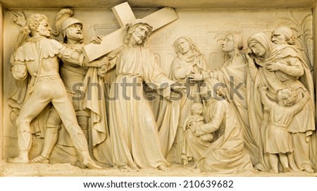 MECHELEN, BELGIUM - JUNE 14, 2014: Stone relief Jesus meet the women of Jerusalem in church Our Lady across de Dyle by P. J de Cuyper.