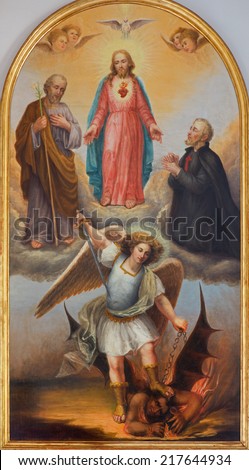 PADUA, ITALY - SEPTEMBER 10, 2014: The paint of The Heart of Jesus, archangel Michael and other saints from 19th century by unknown painter in side chapel of church chiesa di Santa Maria del Torresino.