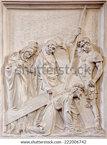 BRUSSELS, BELGIUM - JUNE 15, 2014: Stone relief the Fall of Jesus under cross scene in church Notre Dame du Bon Secource.