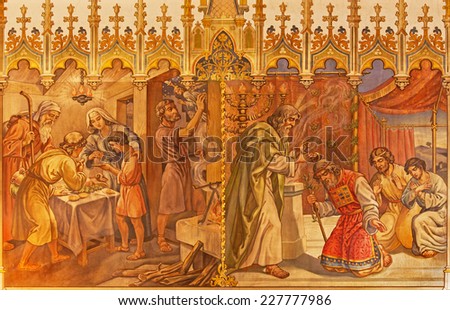 TRNAVA, SLOVAKIA - OCTOBER 14, 2014: The fresco of the scenes Moses and Aron, and Israelites at the Pesach supper at the Lord\'s Passover by Leopold Bruckner (1905 - 1906) in St. Nicholas church.