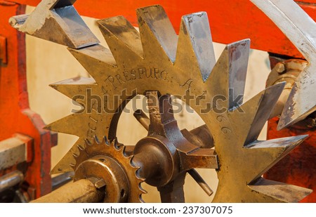 BRATISLAVA, SLOVAKIA - OCTOBER 11, 2014: The detail of old clock-work from tower-clock on the St. Martins cathedral at work. Parts of the machine are from 1766 by master Jacob Halth.