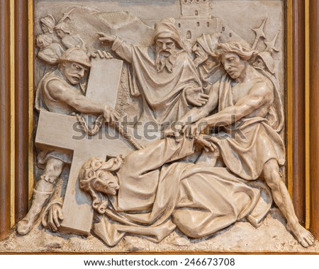 VIENNA, AUSTRIA - DECEMBER 17, 2014: Jesus fall under his cross. Relief as one part of Cross way cycle in Sacre Coeur church by R. Haas from end of 19. cent.