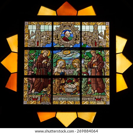JERUSALEM, ISRAEL - MARCH 5 , 2015: The Nativty scene on the rosette in sanctuary of st. Catharine church by P. M. Ganton  from year 1926.