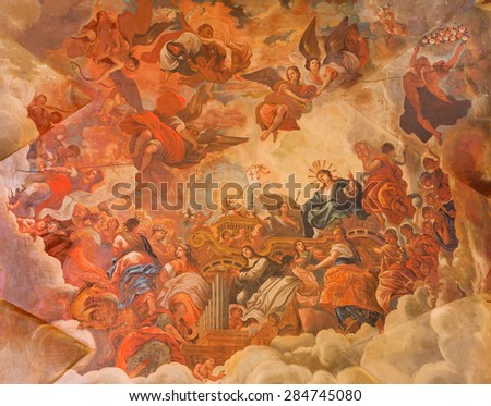 GRANADA, SPAIN - MAY 29, 2015: The ceiling fresco displays the Glory of lamb of God in Basilica San Juan de Dios by  Diego Sanchez Sarabia from second part of 18. cent.