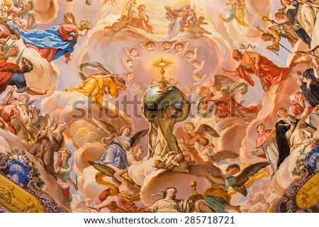 GRANADA, SPAIN - MAY 31, 2015: The detail of fresco in baroque sanctuary (Sancta Sanctorum) in church Monasterio de la Cartuja with St. Bruno and glory of Eucharist by Palomino (early of 18. cent.)